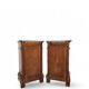 A pair of antique walnut bedside tables from the 1890s.
