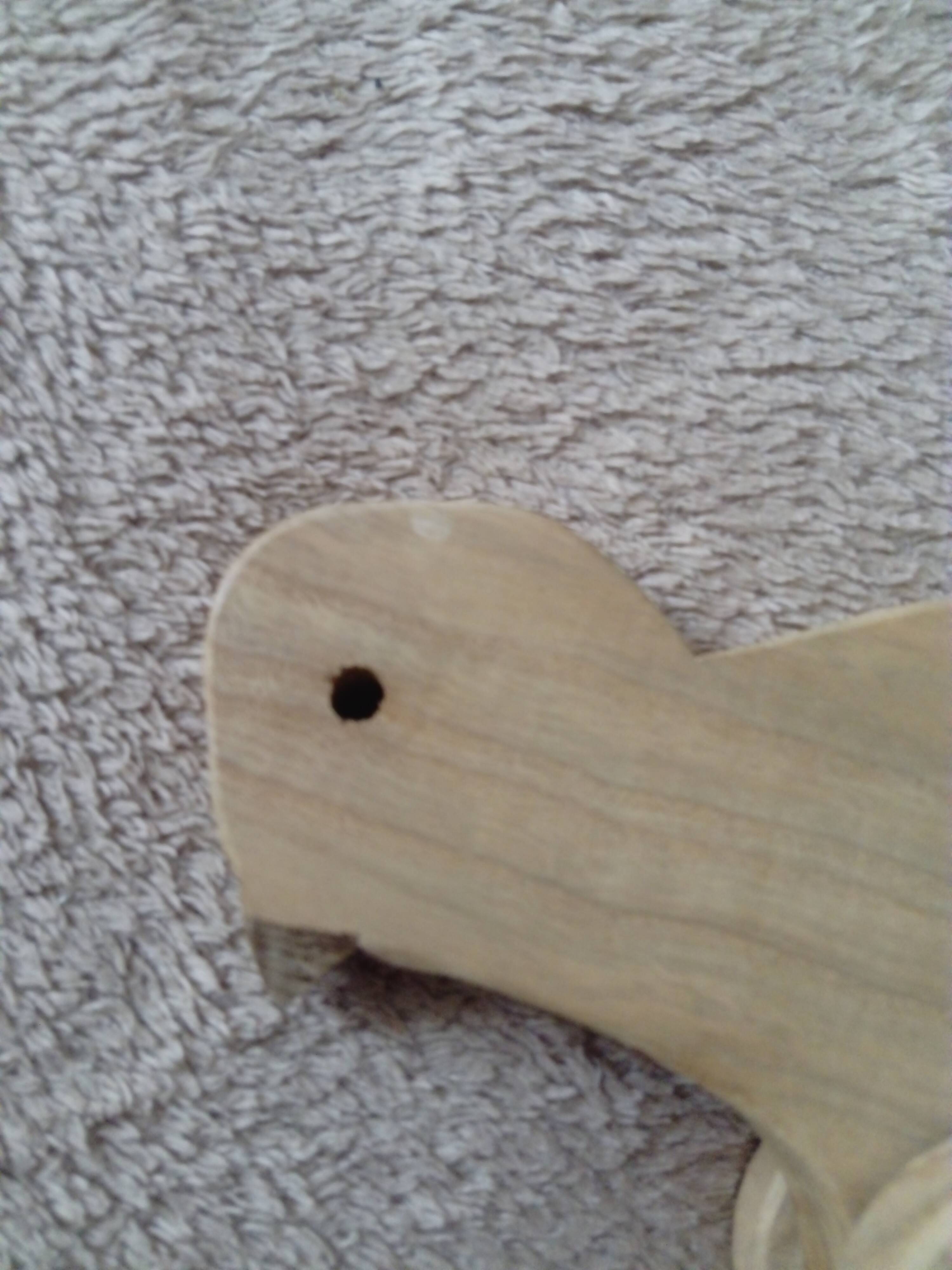 set of 4 wooden toys on wheels