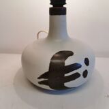 Ceramic table lamp designed by Danish Axel Larsen for his company Axella back in the 1960s.