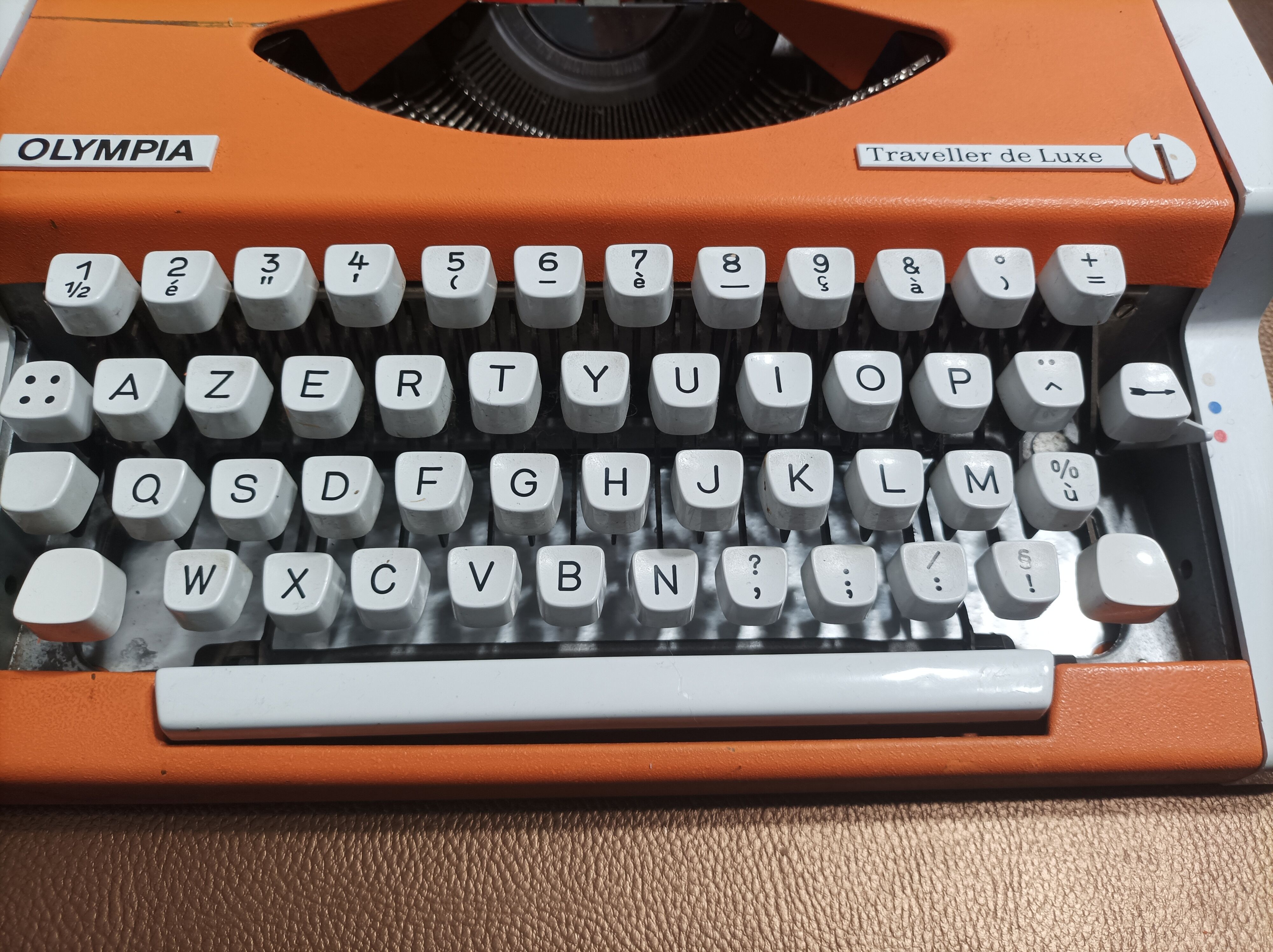 Olympia traveller luxury typewriter orange revised and new ribbon