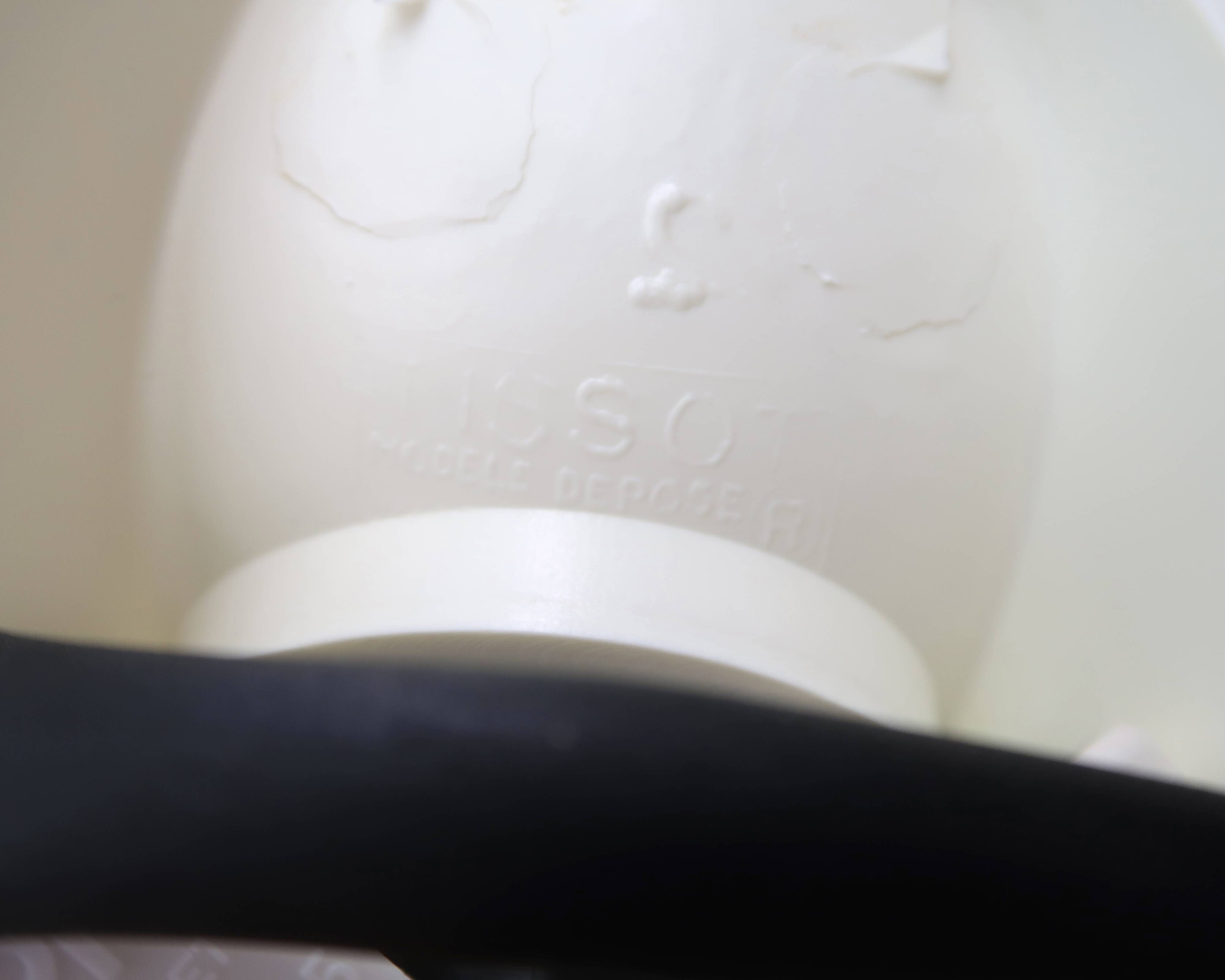 White Tissot wall light with opaque glass globe, 1970s/80s