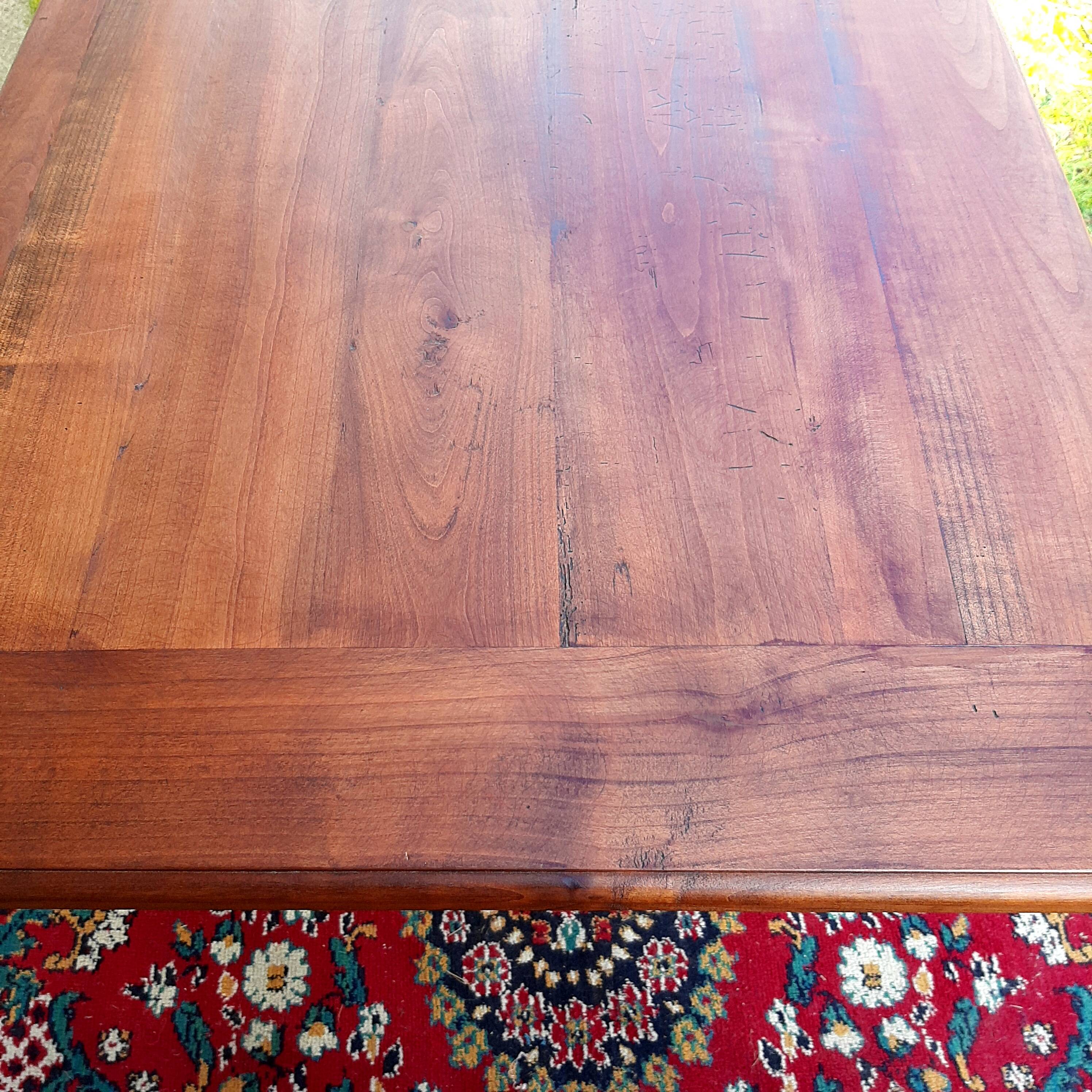 Large bistro table with cast iron legs and cherry top