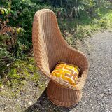 Rattan armchair and its cushion, 1960