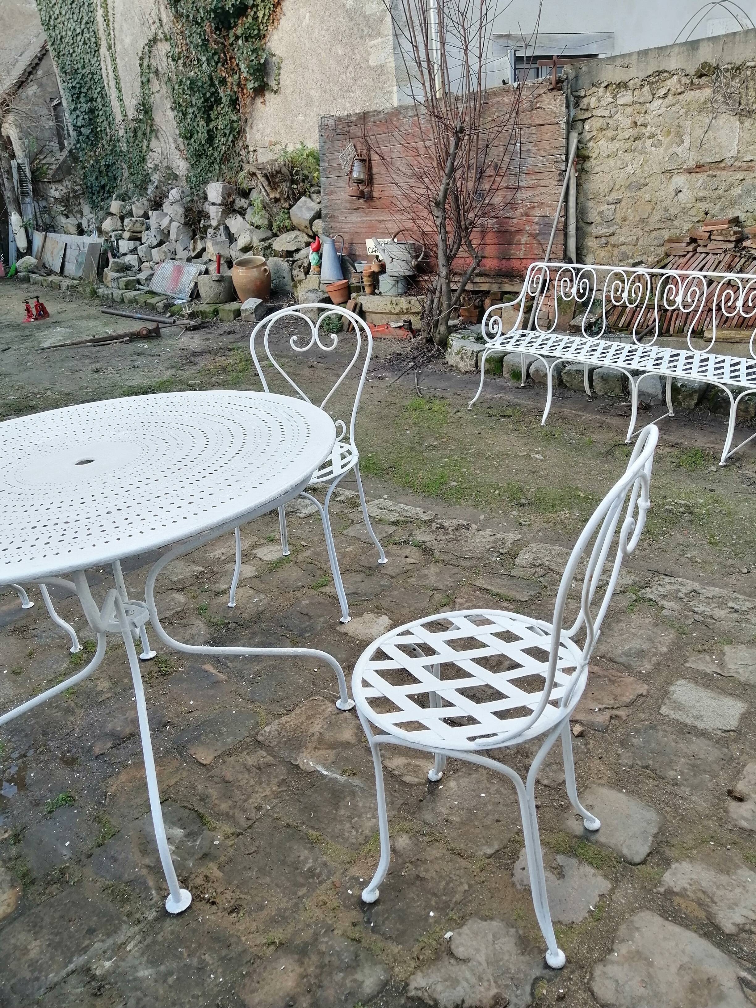 Antique wrought iron garden furniture