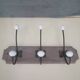 Wall coat rack in wood and porcelain