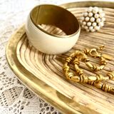 Empty rattan and brass pocket