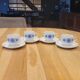 4 vintage coffee cups and their saucers