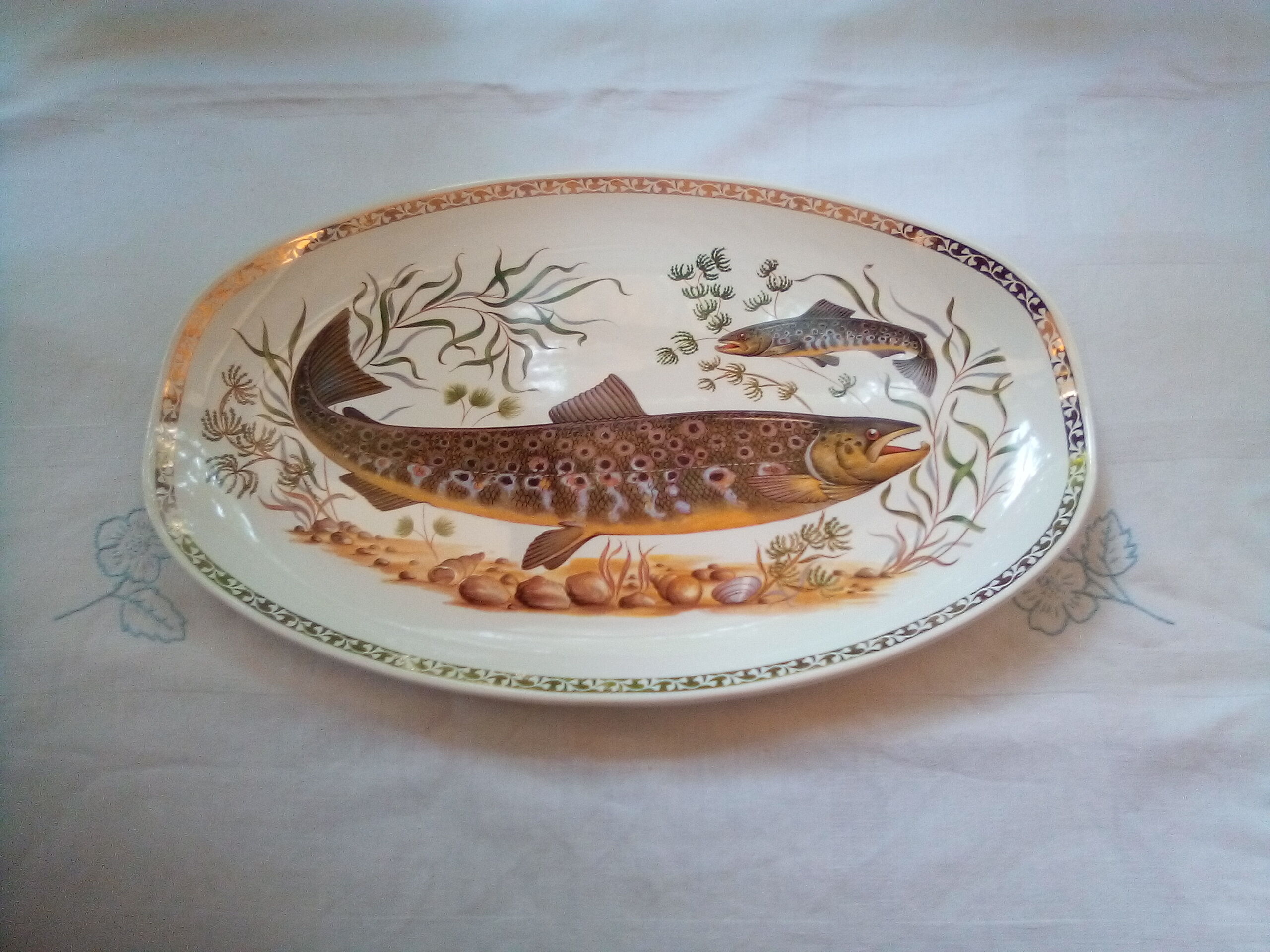Set of 12 Longchamp plates and fish dish