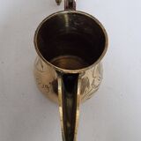 Small carved brass pourer