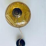 Amber glass ball suspension