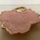 Tray, ring holder in the shape of a pink and gold leaf.