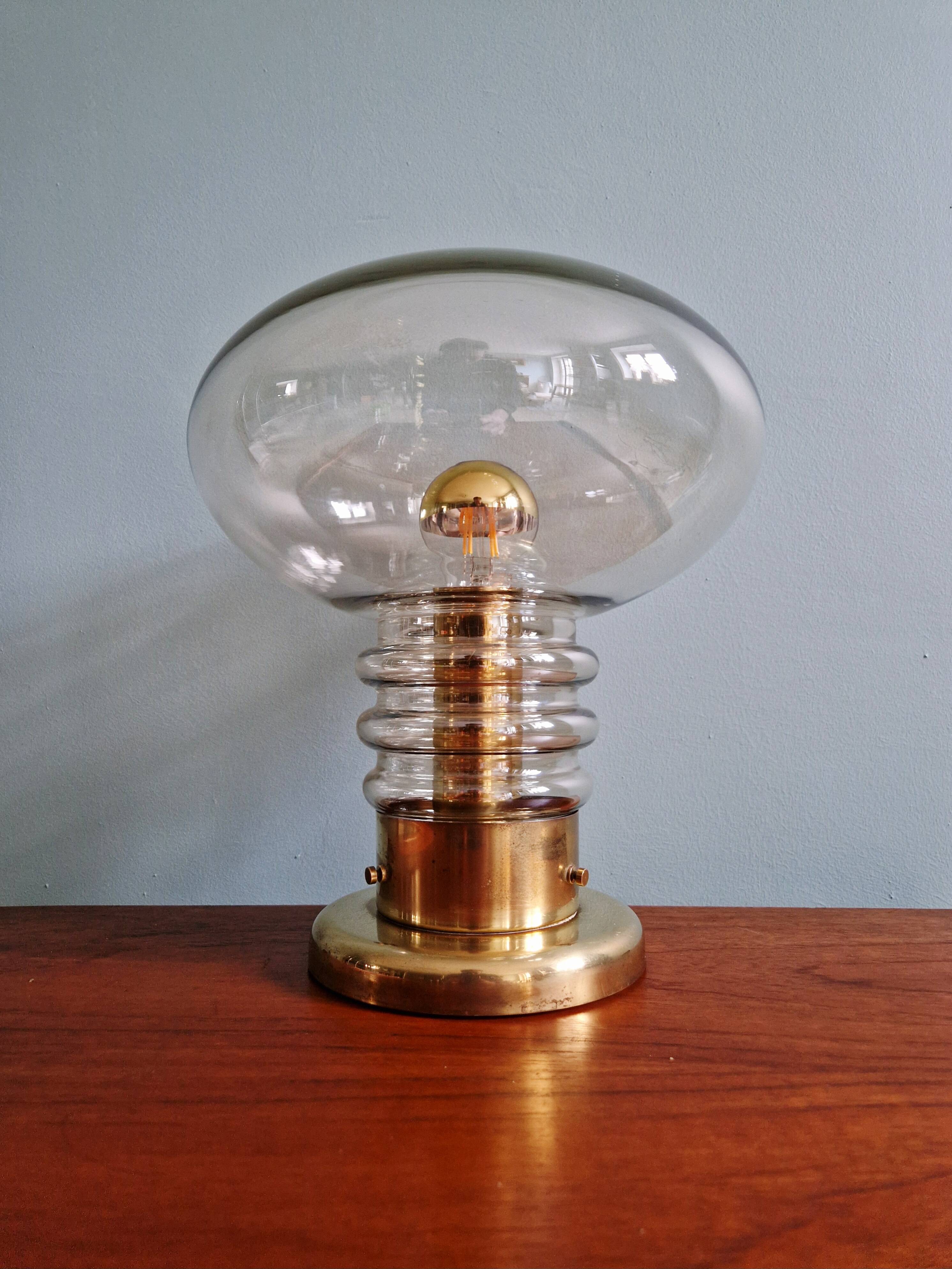 Space Age table lamp in brass and clear glass, 1960s-70s.