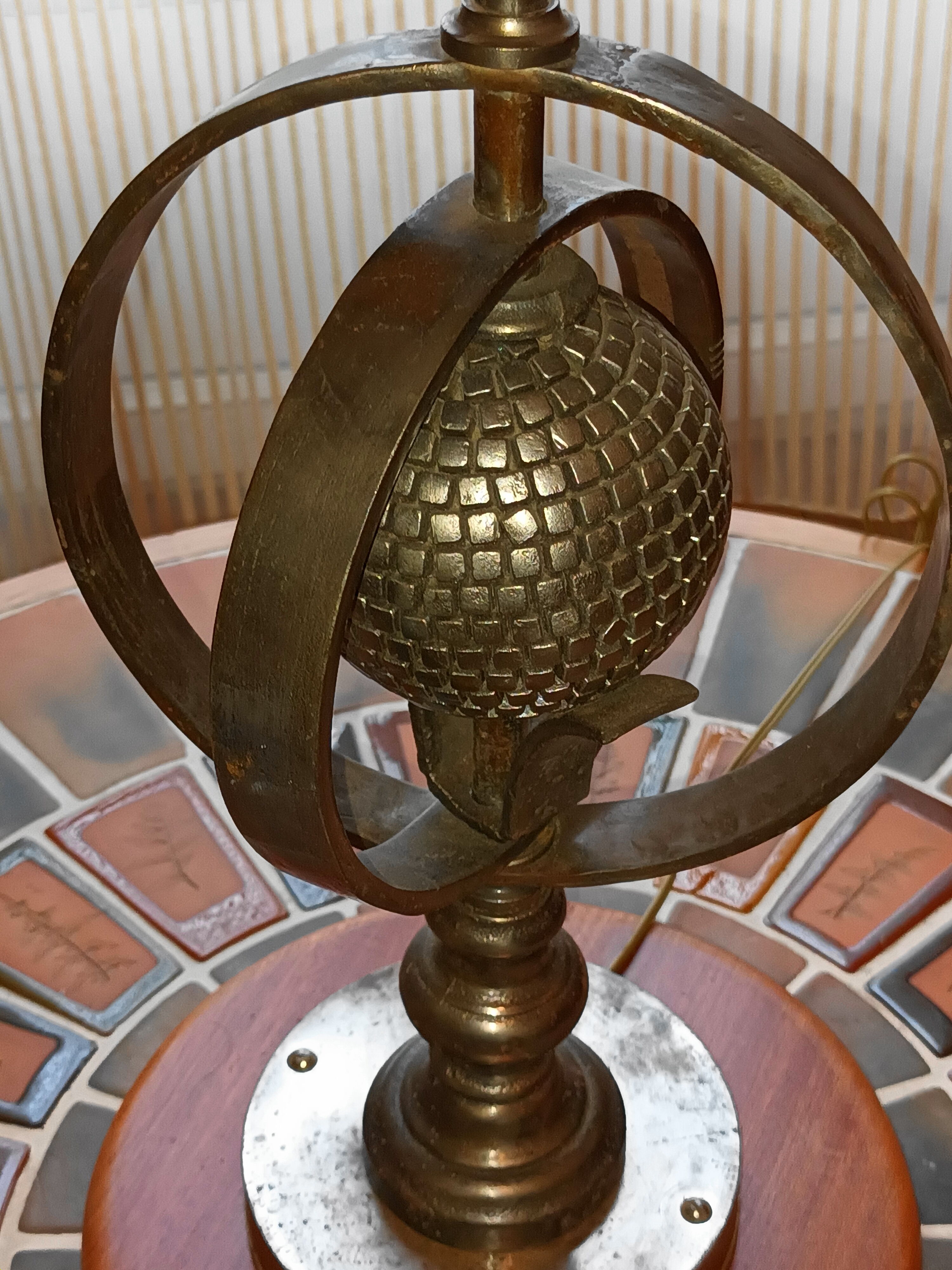 Wrought iron lamp with armillary sphere decorations