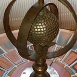 Wrought iron lamp with armillary sphere decorations