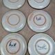 Set of 6 handmade flat plates signed by Maïté – hand-painted designs