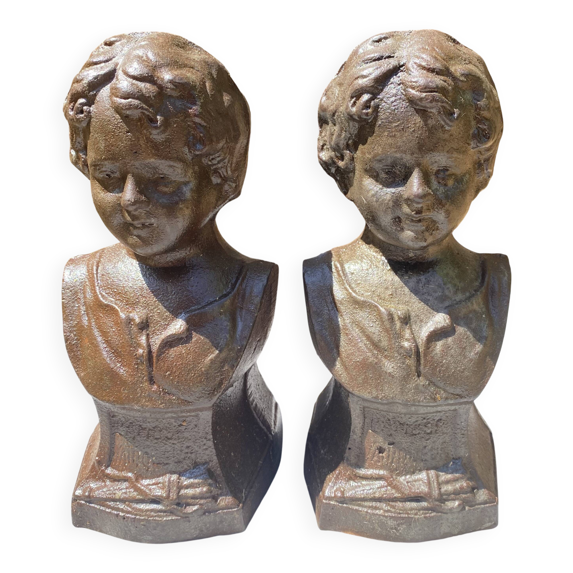 Pair of antique cast iron fire dogs "The Conquering Love"