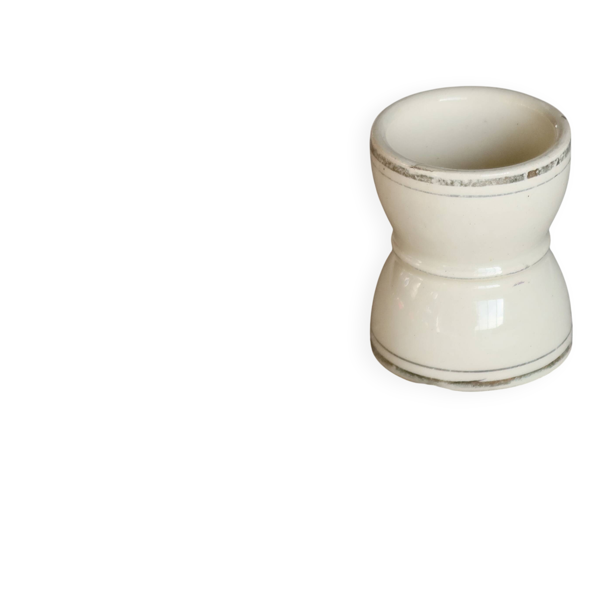 Antique egg cup, ironstone diabolo, ivory and gold edging