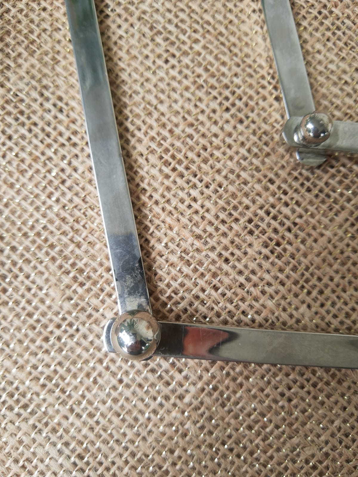 Stretchy silver metal flat bottom
