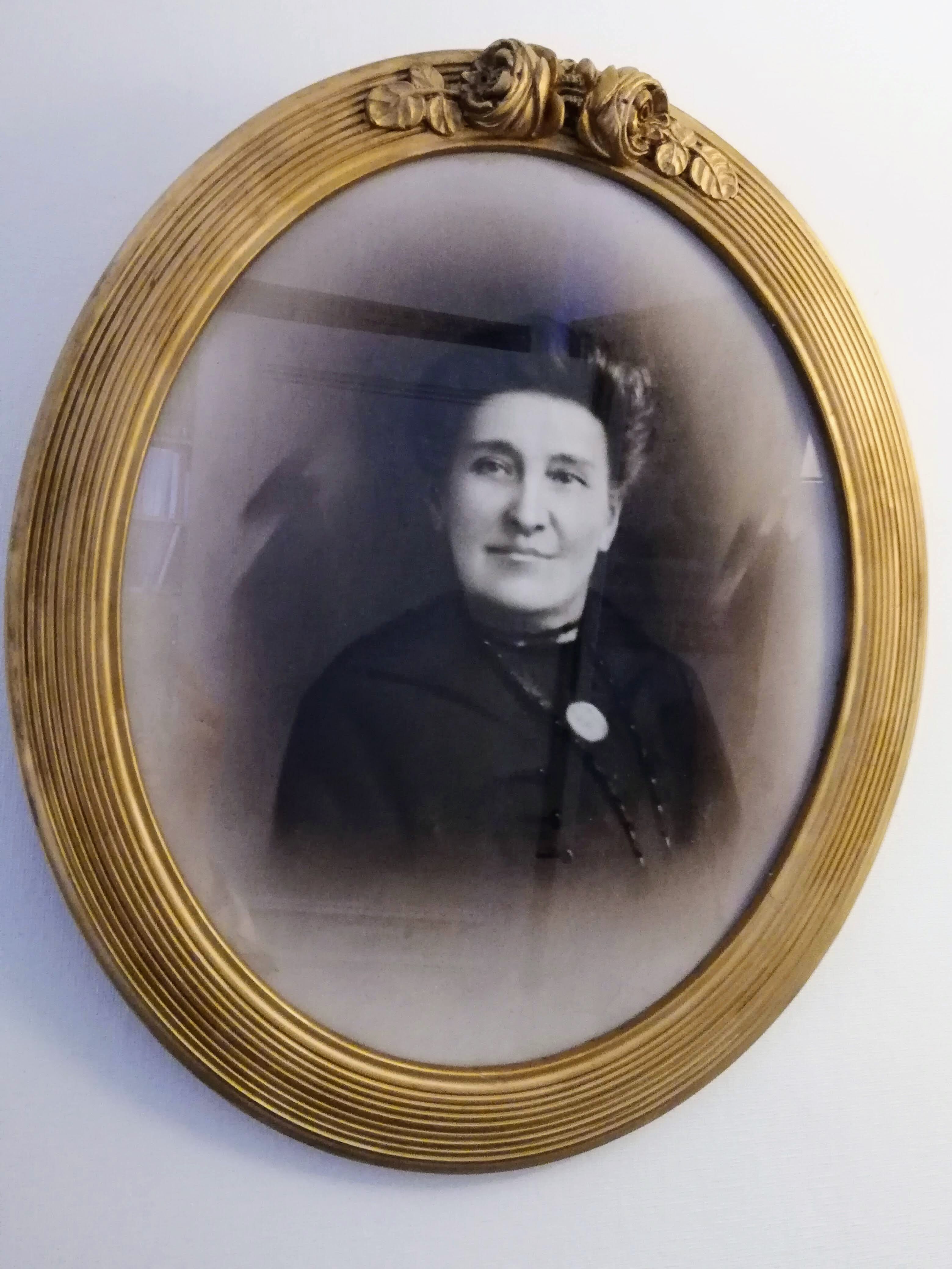 Oval gold frame art deco