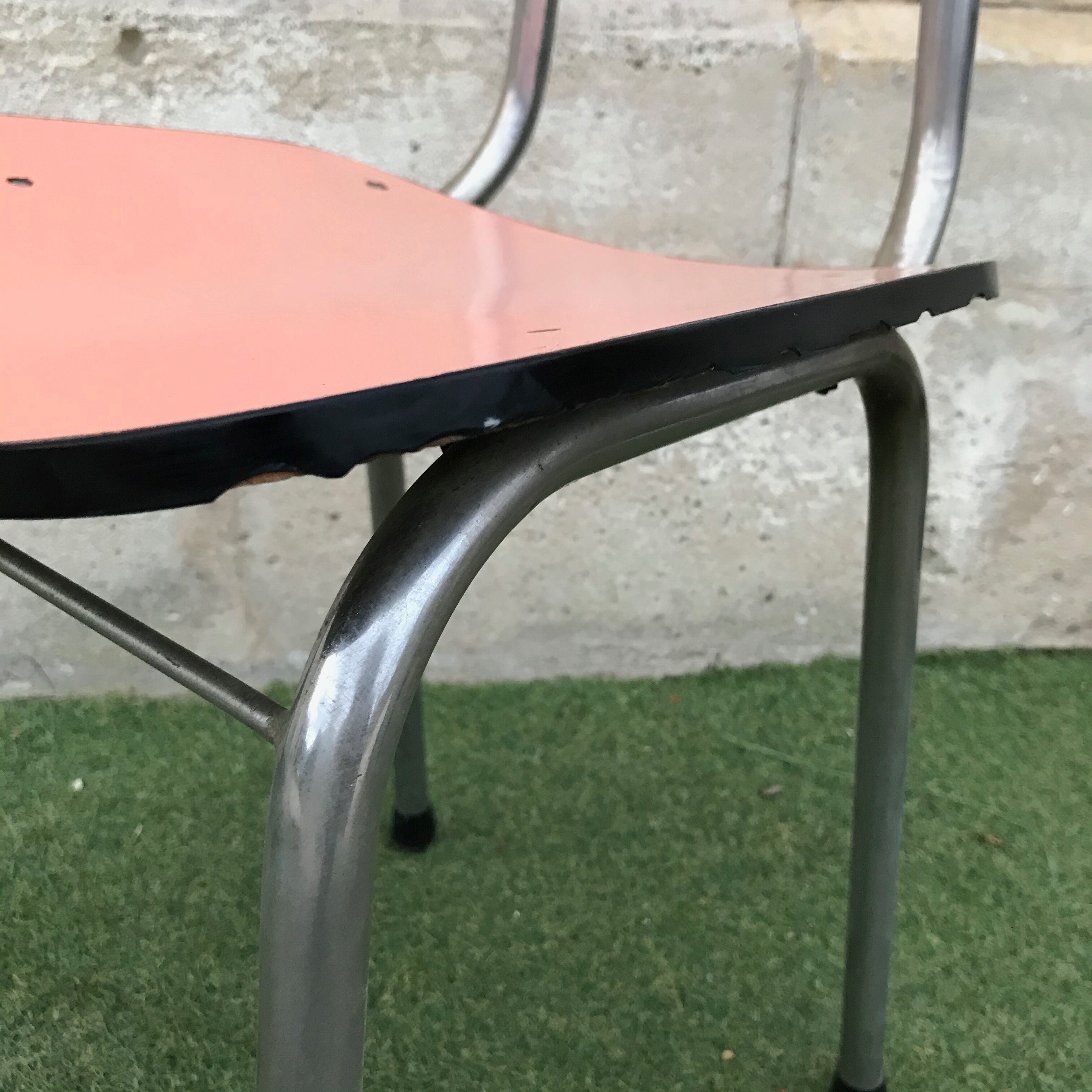 Pink chair in formica