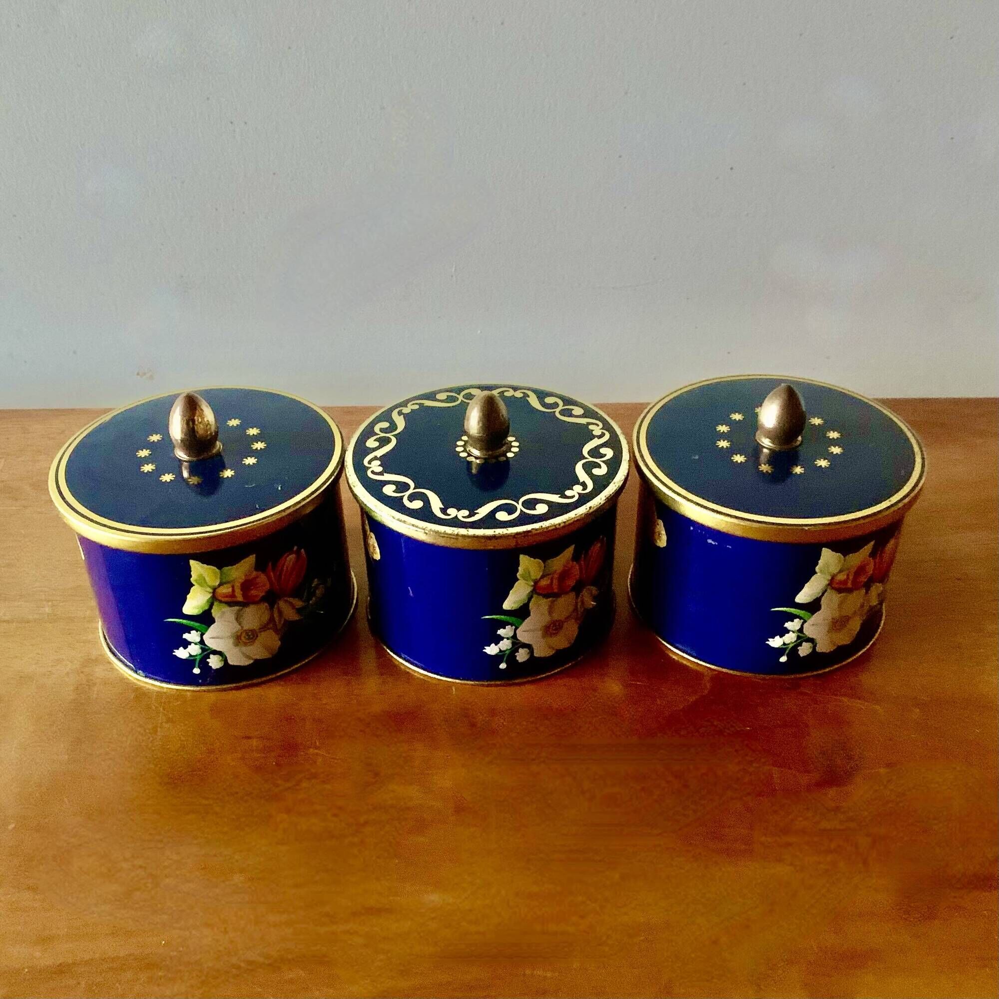 Trio of old Côte d'Or metal chocolate boxes - floral decoration
