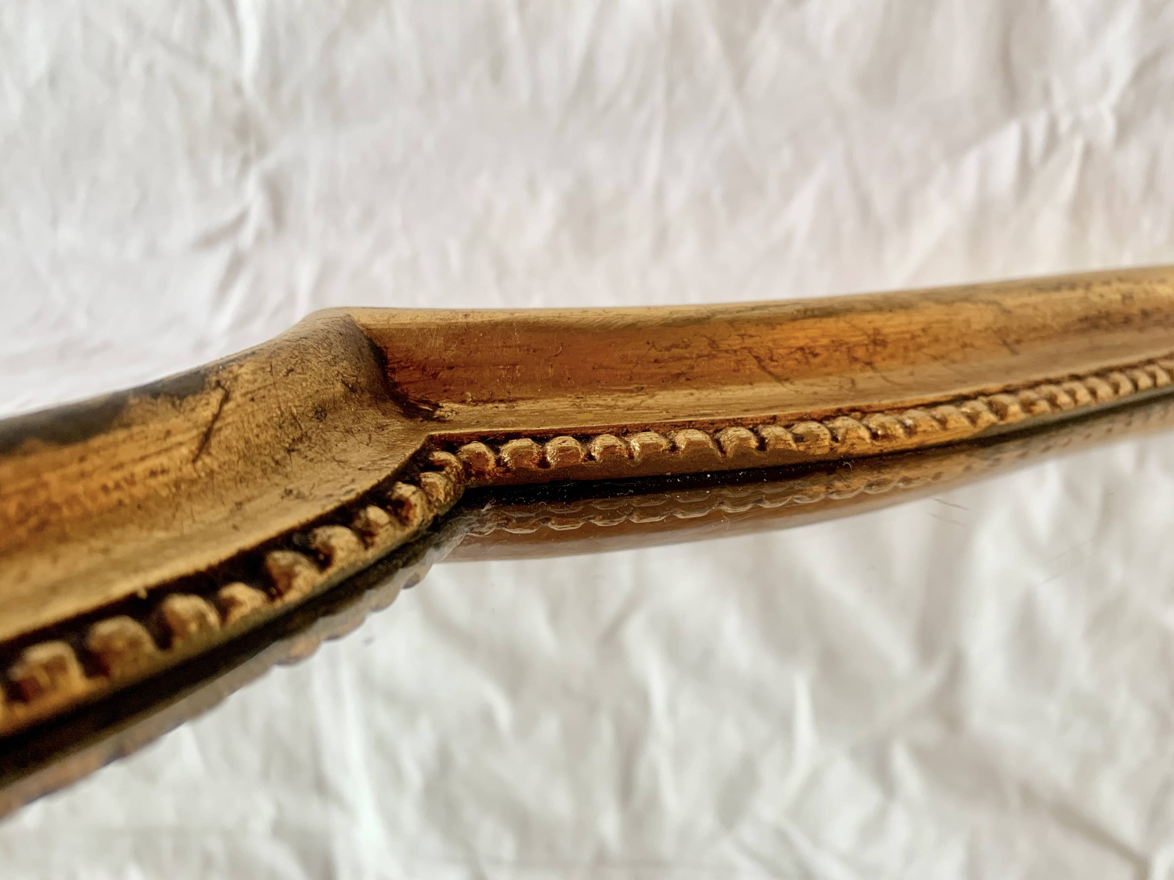 Vintage wall mirror in gilded wood