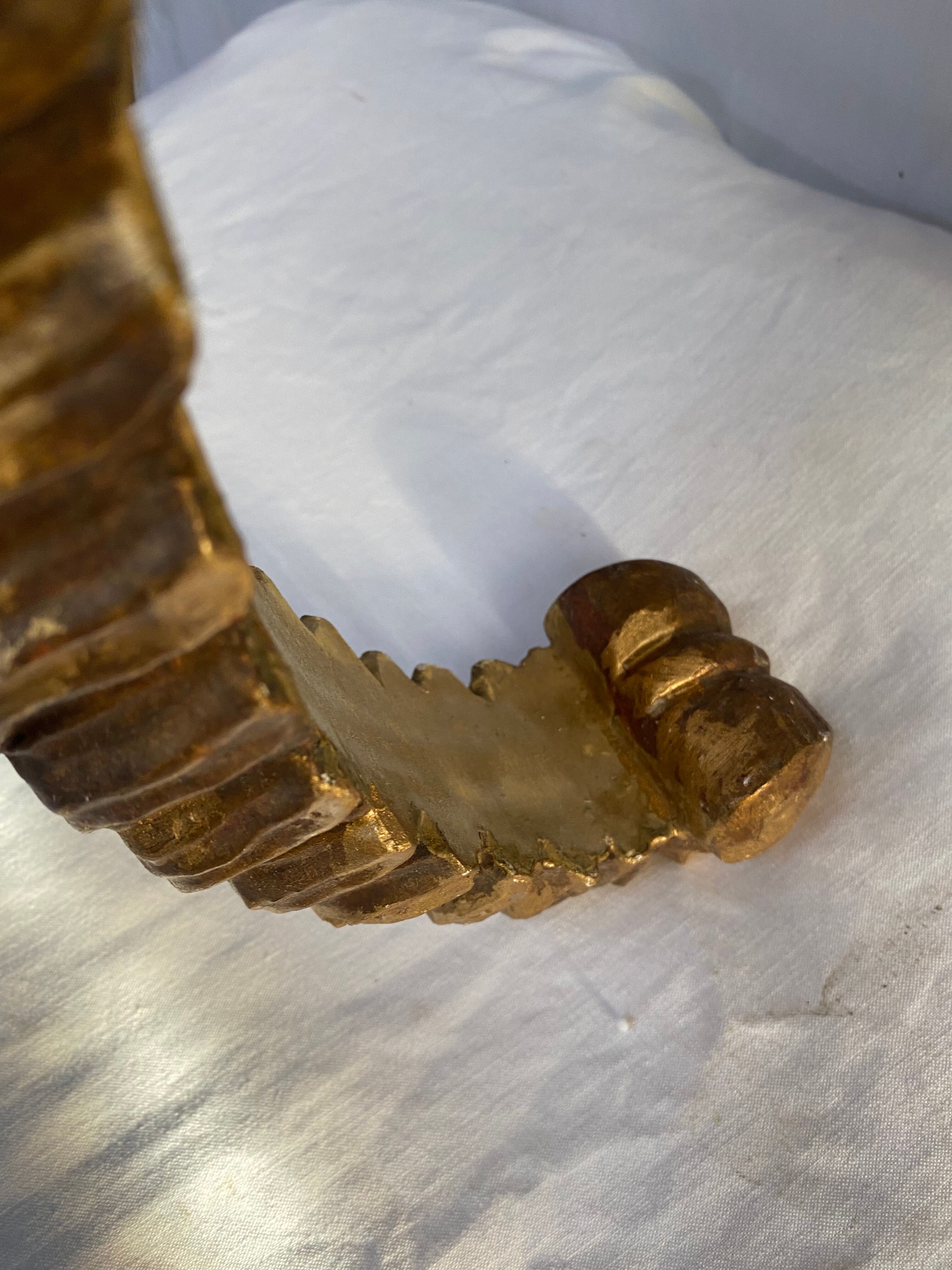 Wooden wall console and antique gilded stucco