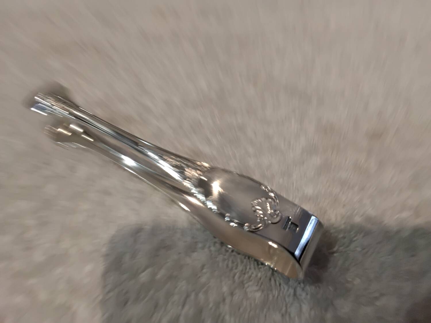 Small silver-plated sugar tongs by Christofle Marly, 11.3 cm