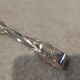 Small silver-plated sugar tongs by Christofle Marly, 11.3 cm