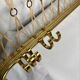 Vintage 'gold' wall coat rack