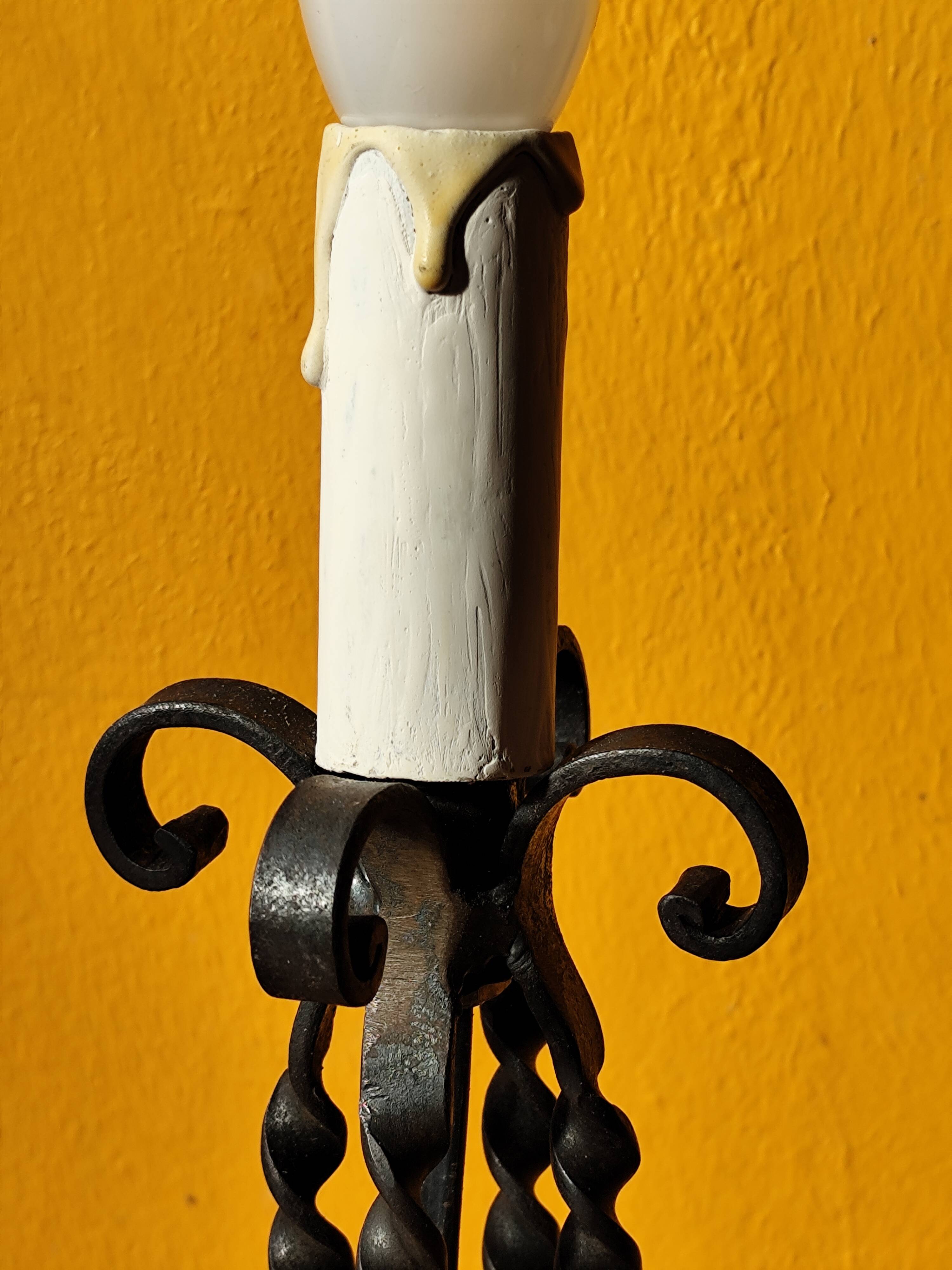 Old metal lamp and fake candle