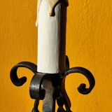 Old metal lamp and fake candle