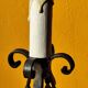 Old metal lamp and fake candle