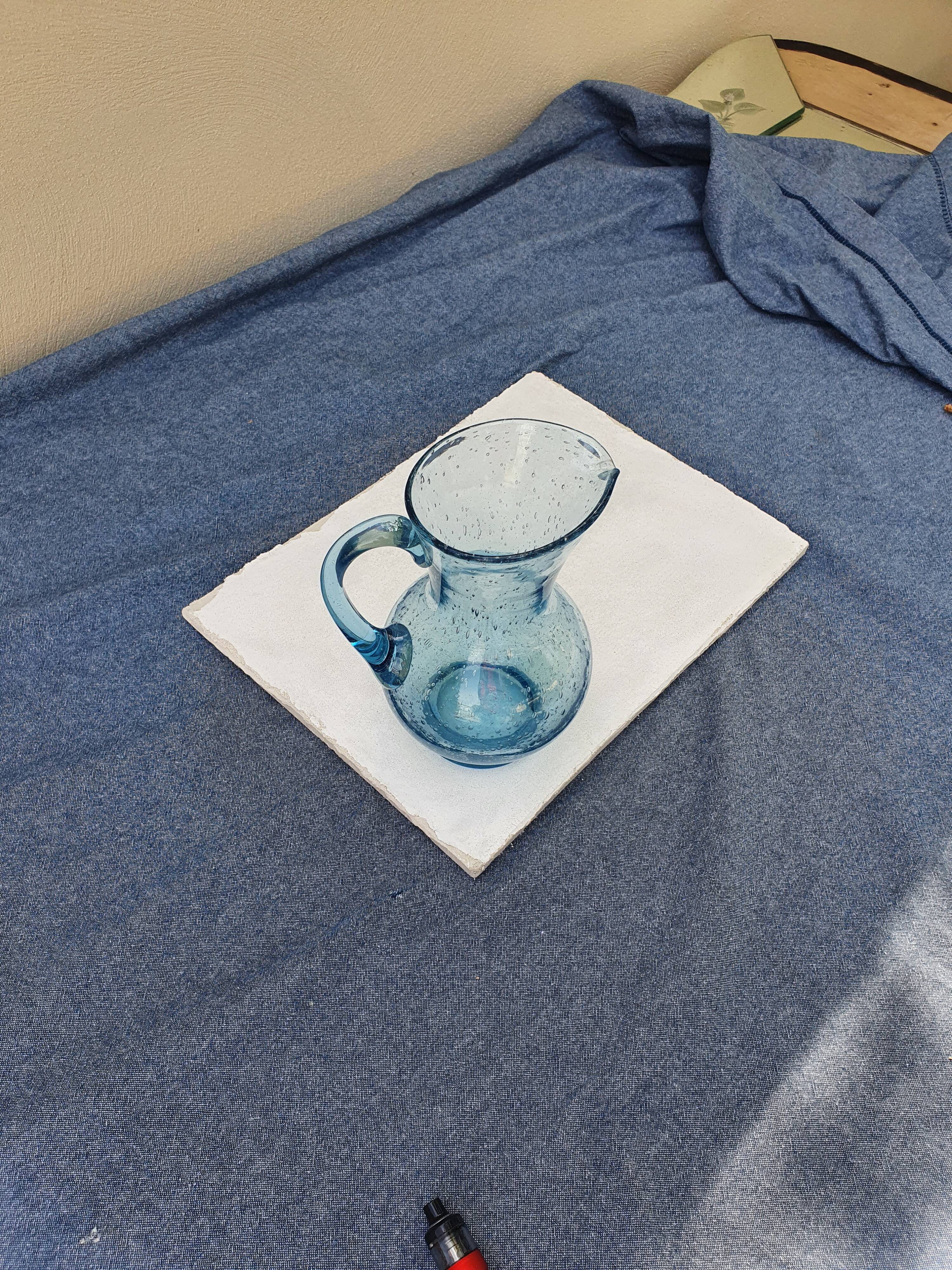 Pitcher or carafe in bubbled glass biot light blue