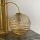 Baladeuse globe vintage en verre ambré 