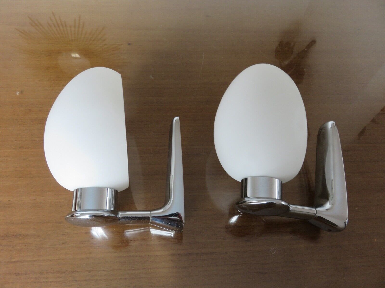 Wall lamps in chromed metal and opaline glass