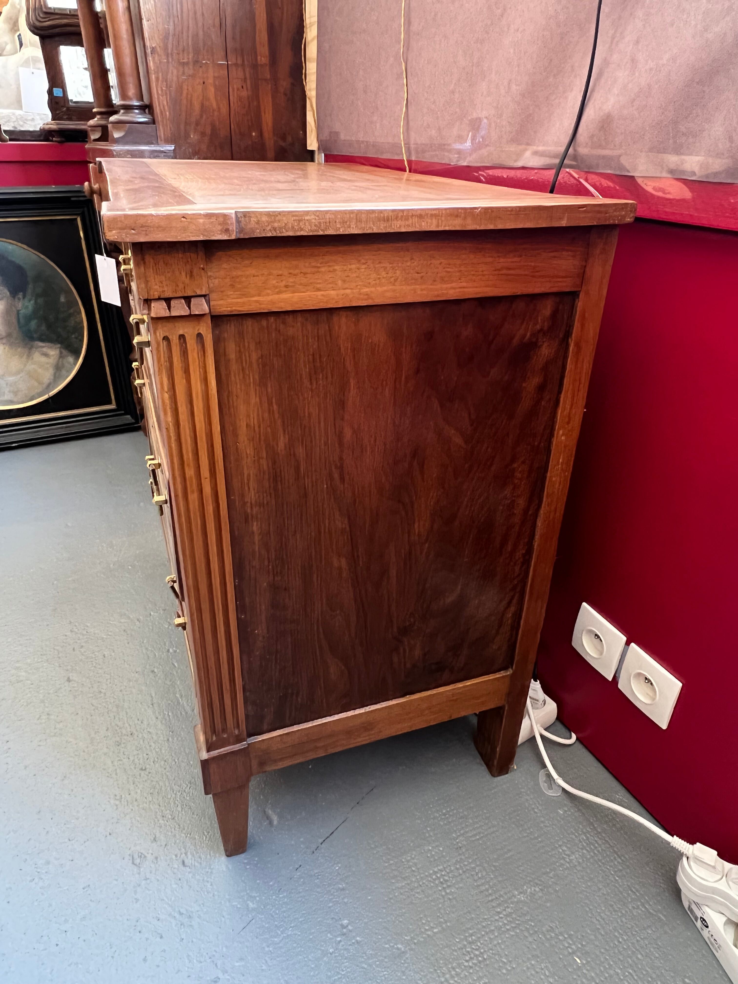 Chest of drawers louis XVI style, early twentieth in solid walnut