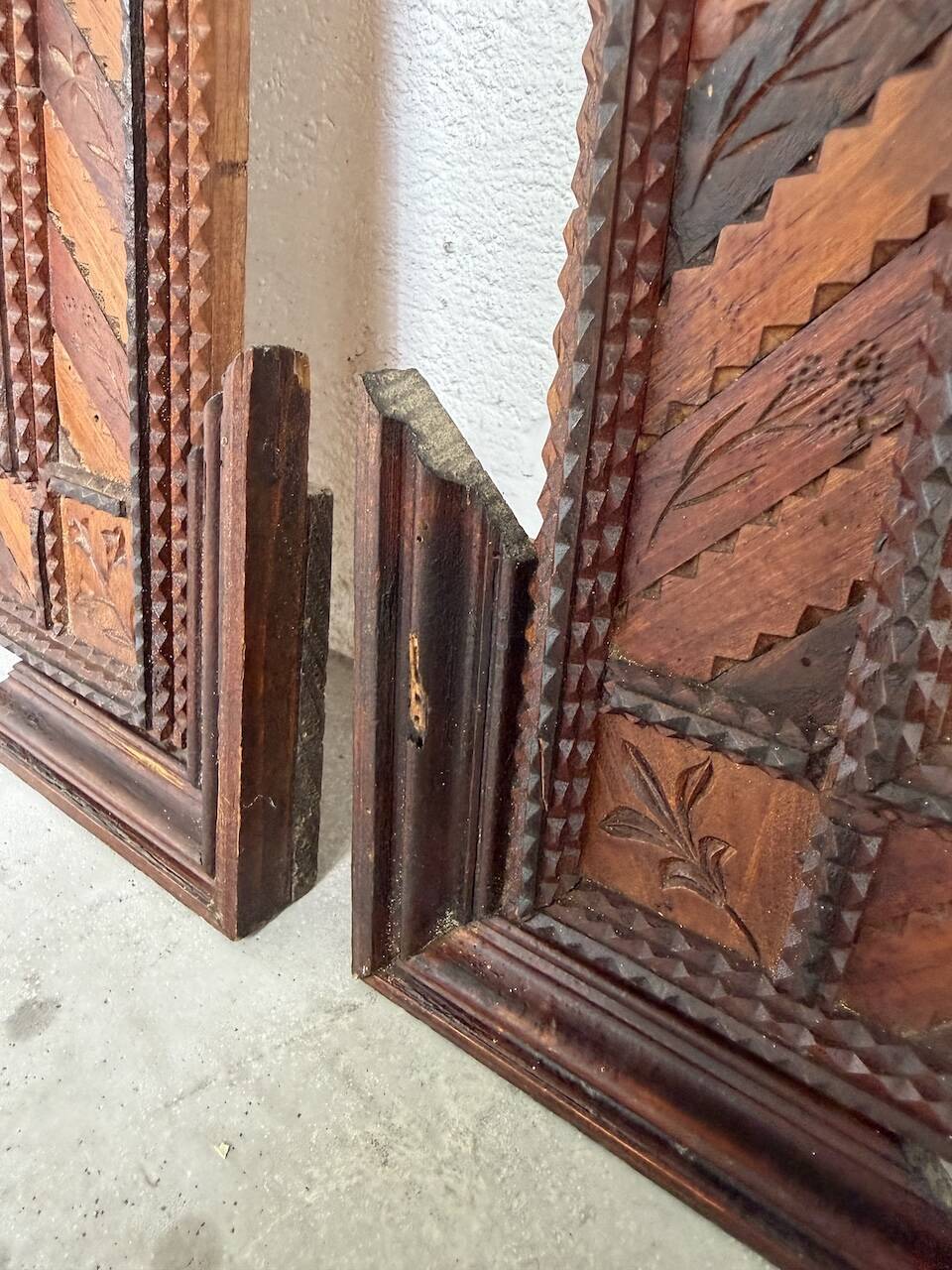 Pair of wooden mirrors in tramp art style