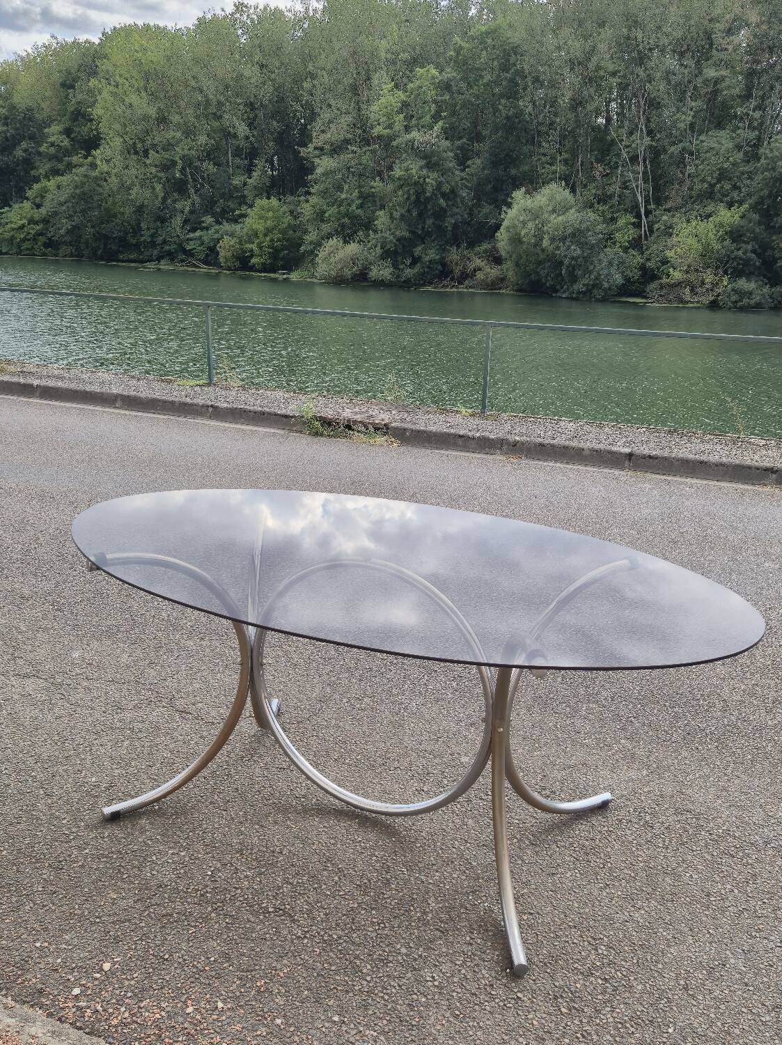 Vintage oval design table in smoked glass and chrome legs