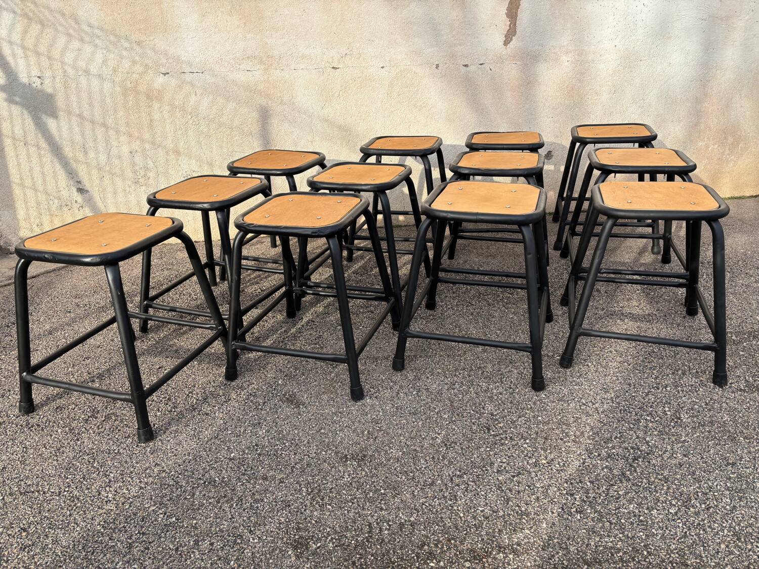 Set of 12 black industrial stools