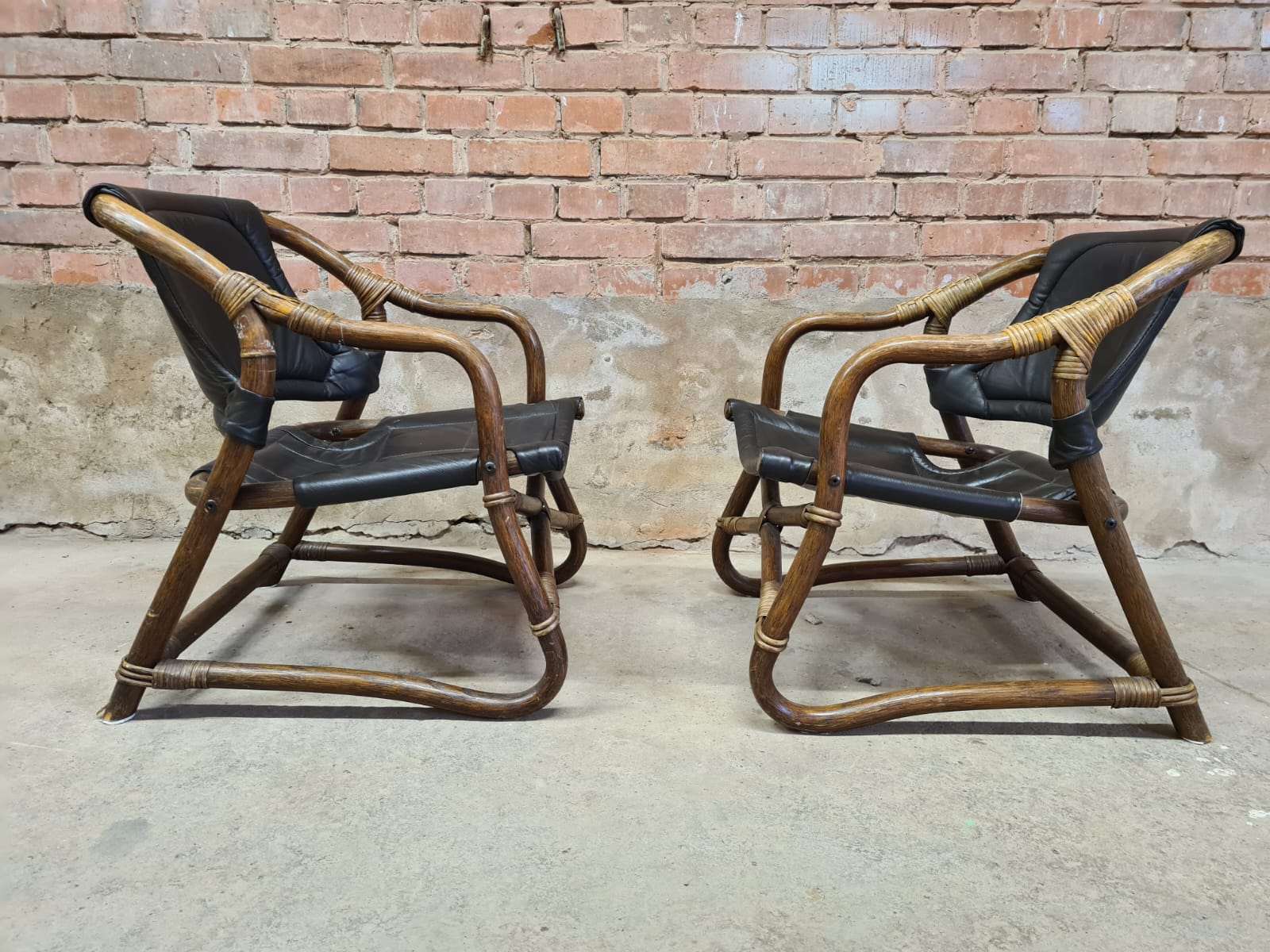 Pair of vintage skaï bamboo armchairs