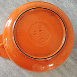 Nomar fondue service in orange cast iron