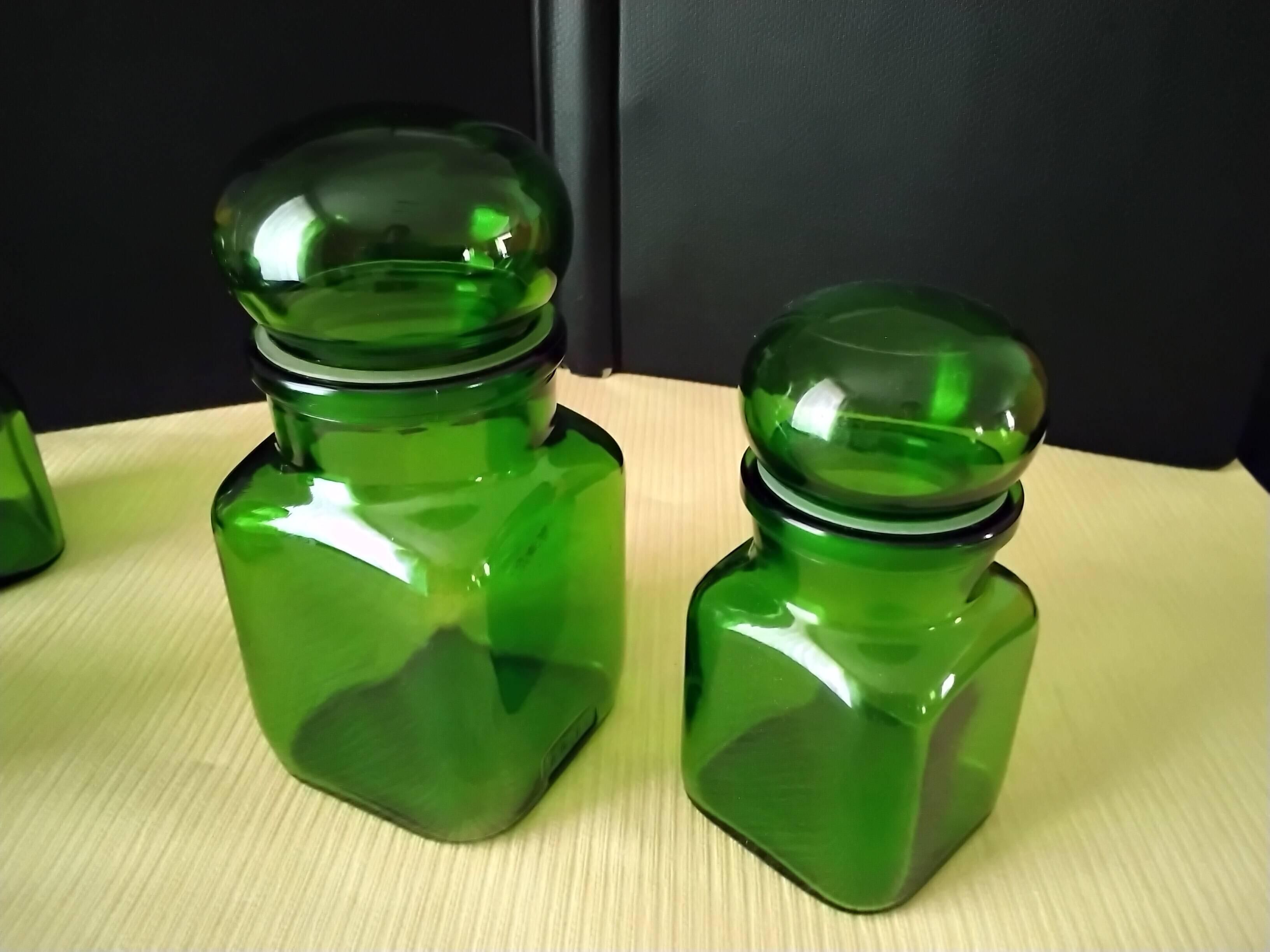Set of 4 green glass jars, bottles from the 1970s.
