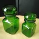 Set of 4 green glass jars, bottles from the 1970s.