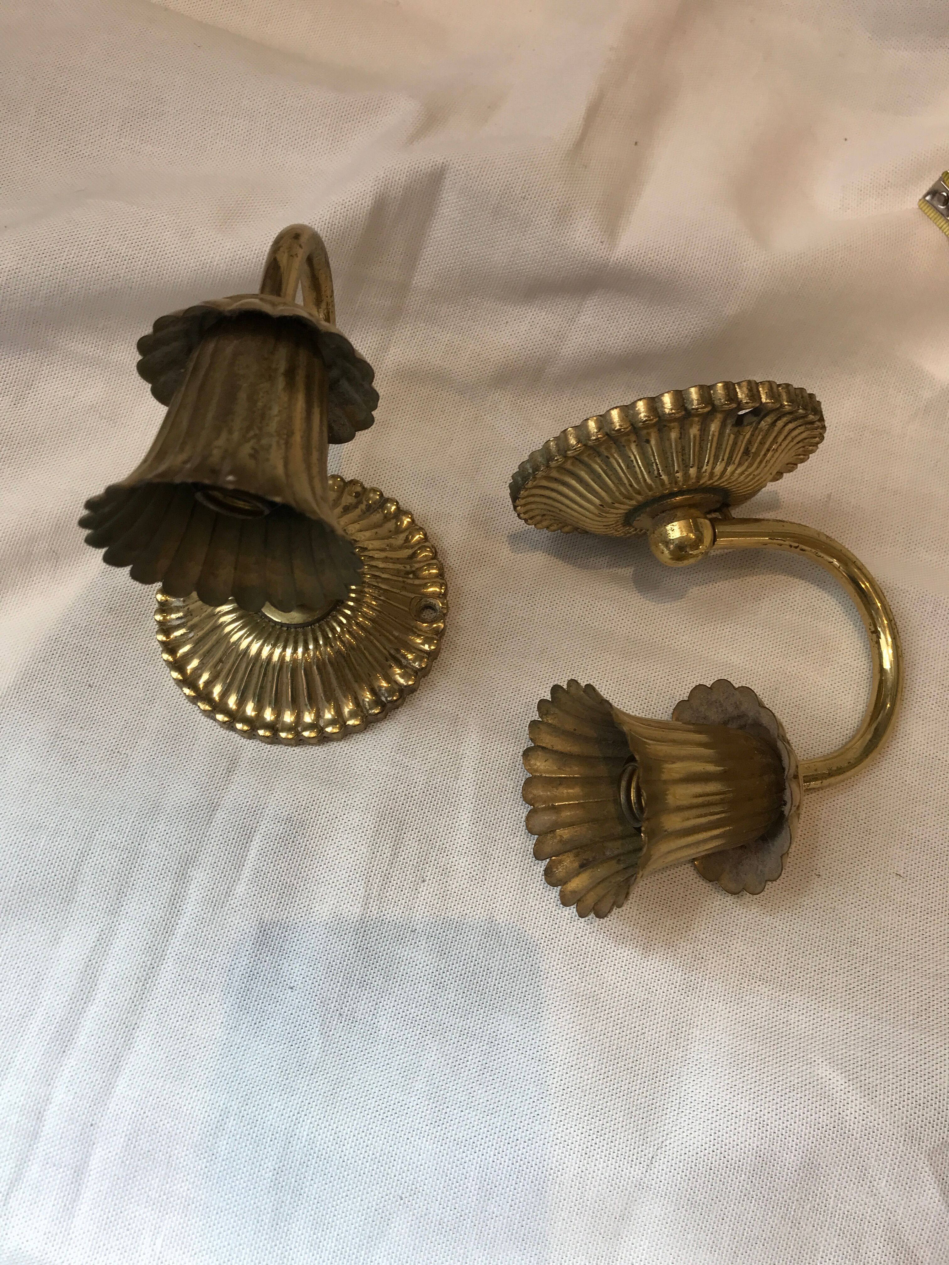 Pair of golden wall light