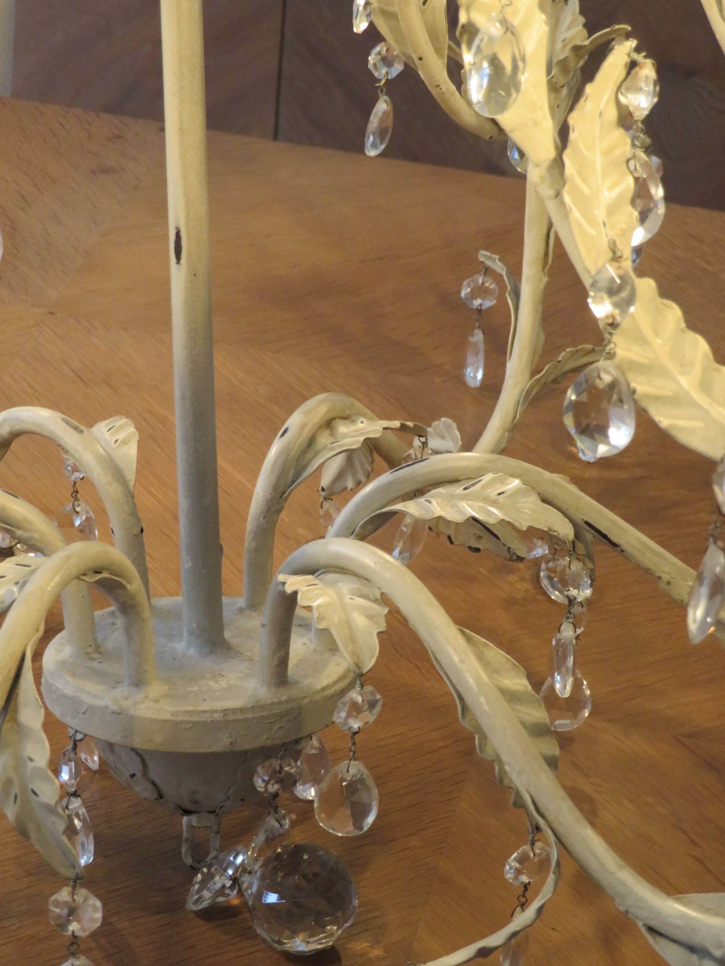 Large cage chandelier in aged metal.