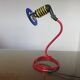 Spiral lamp in primary colours from the 80s Memphis era.