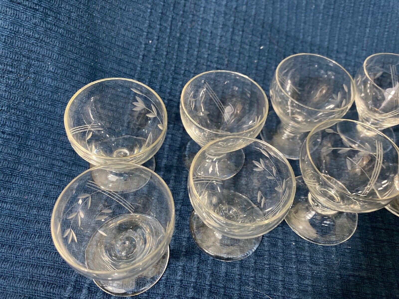 Set of 12 hand-sized crystal glasses with flower decoration
