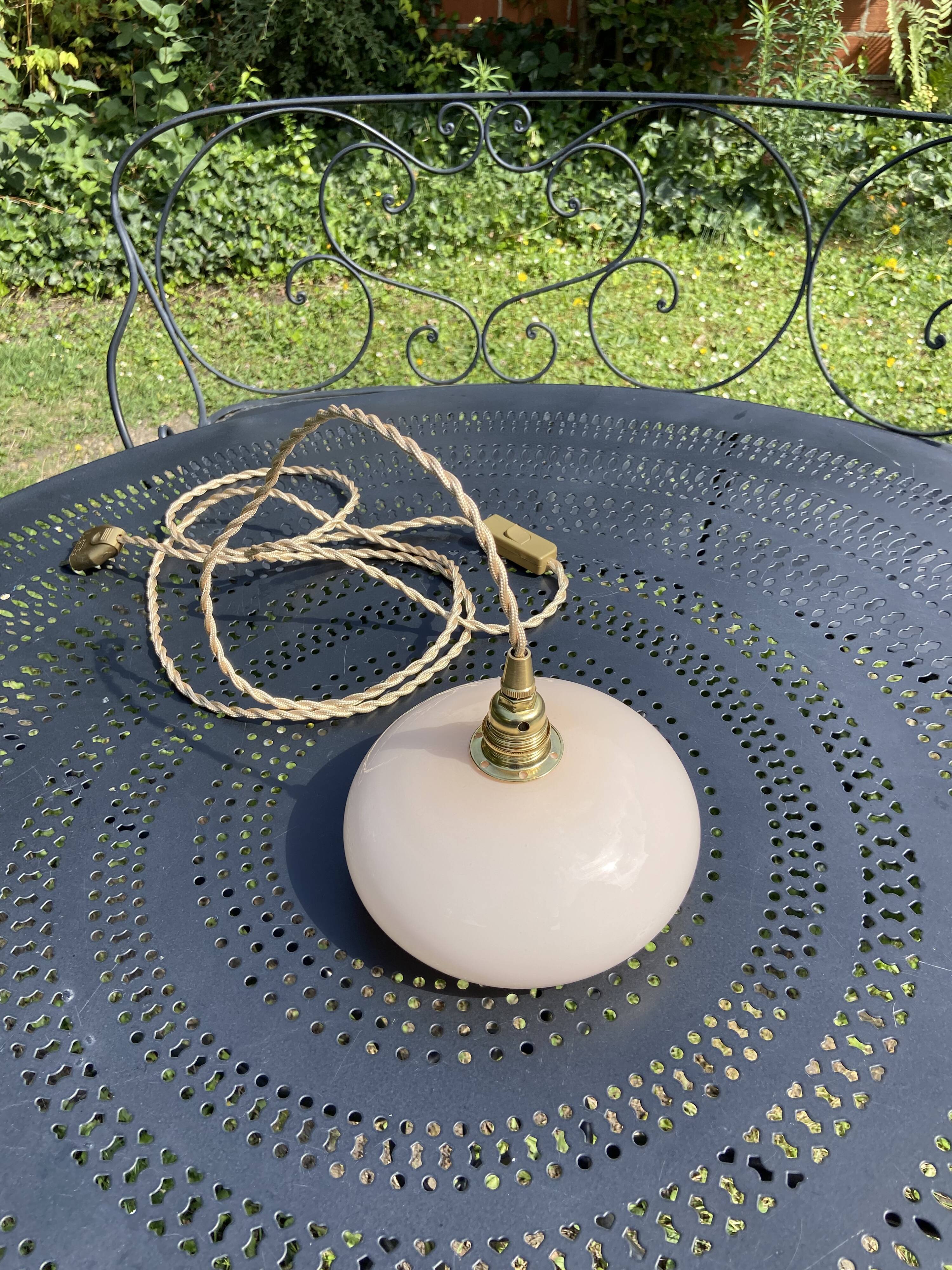 Vintage powder pink opaline globe player 1950