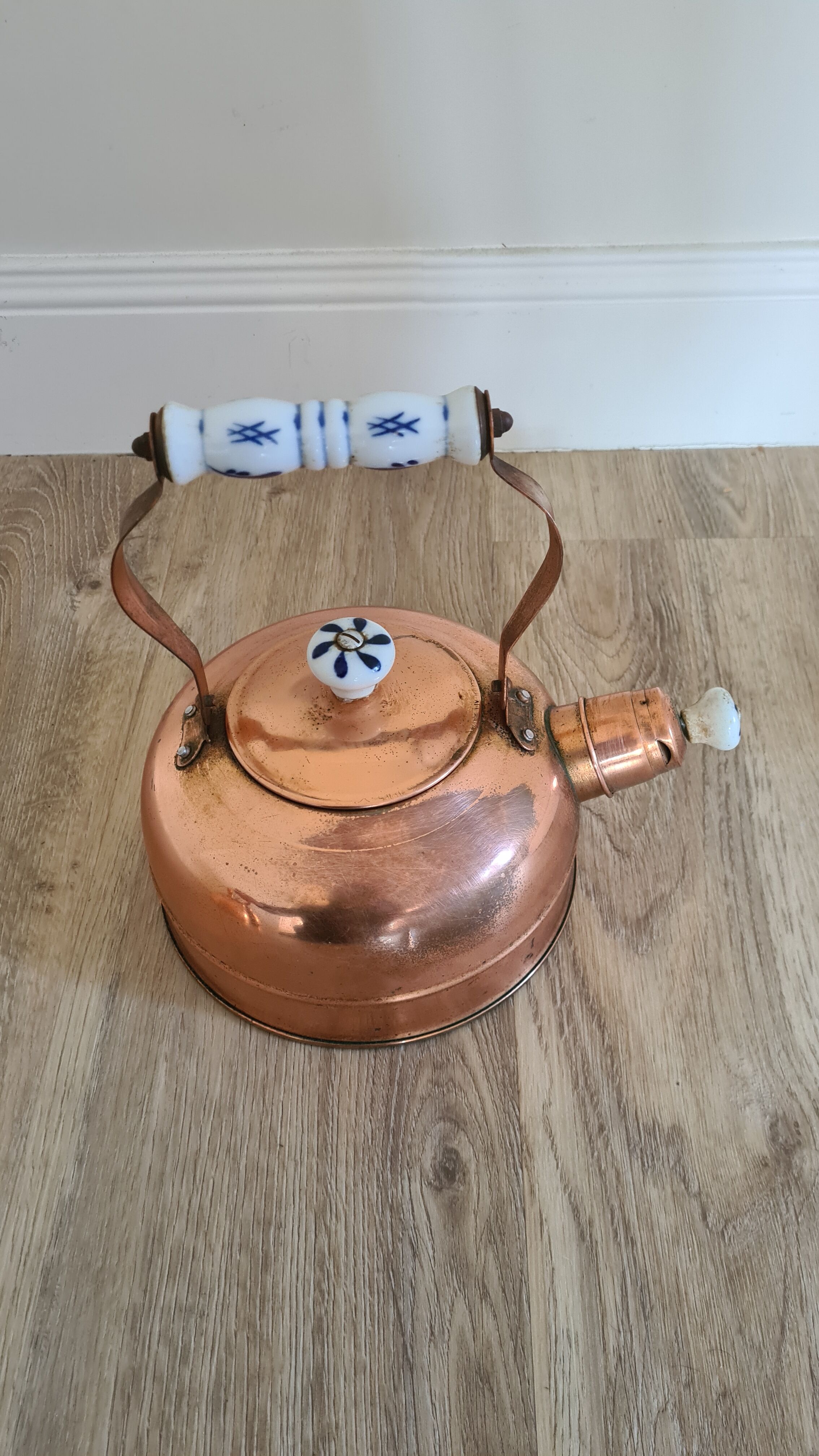 Old copper and porcelain teapot